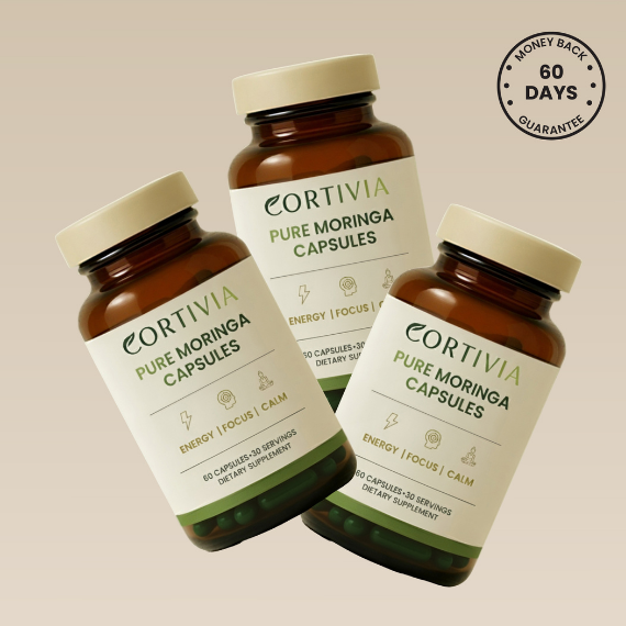 Three bottles of Moringa capsules with a 60-day guarantee label.