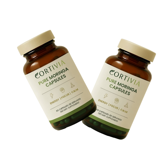 Two labeled bottles of Pure Moringa Capsules on a white background.