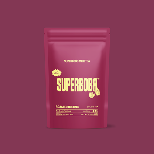 Packaging of SuperBoba roasted oolong milk tea on a maroon background.