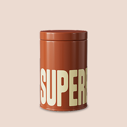 Brown cylindrical tin with 'SUPER' written in large white letters.