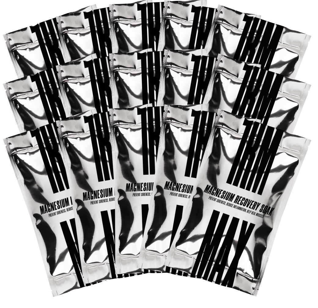 A fan of shiny silver packets labeled 'TRM Magnesium Recovery Soak' against a white background.