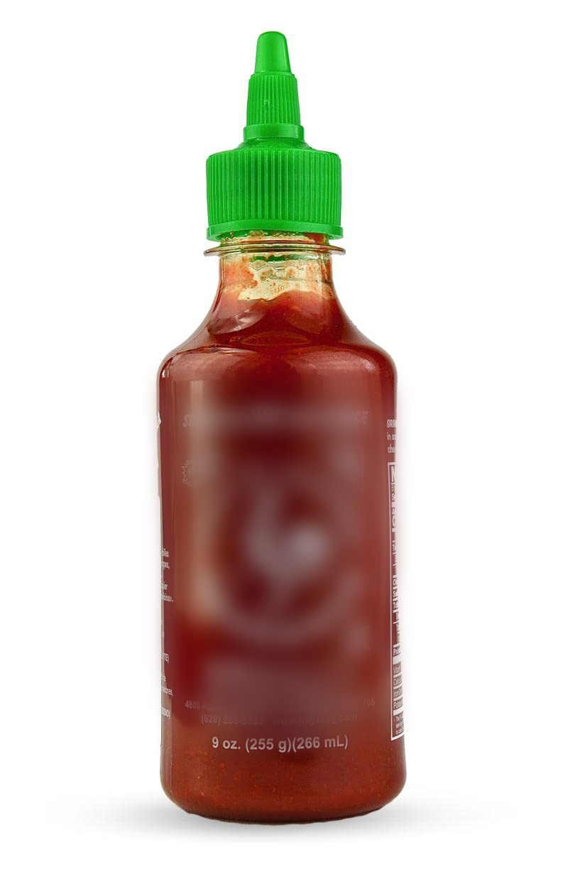 Tabasco pepper sauce bottle with a red cap and green label.