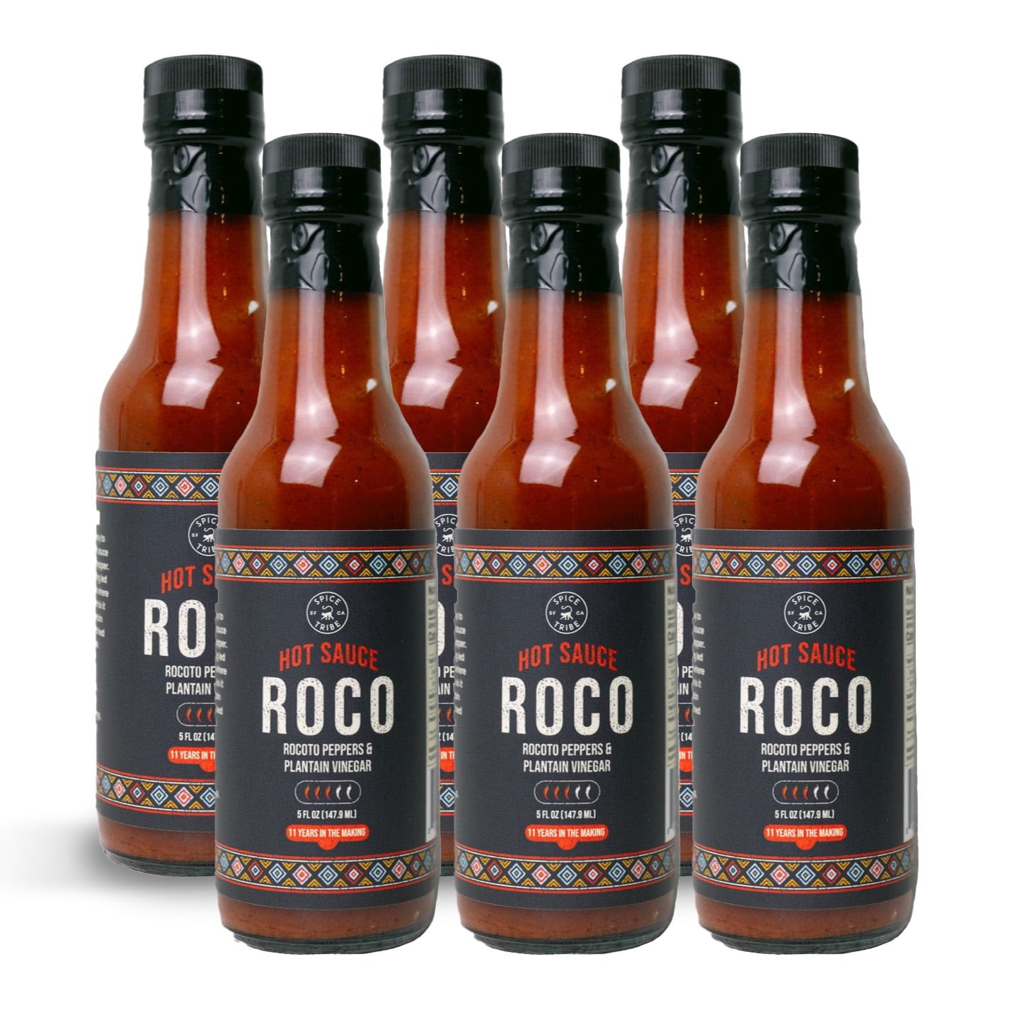 Six bottles of Roco hot sauce with colorful labels.
