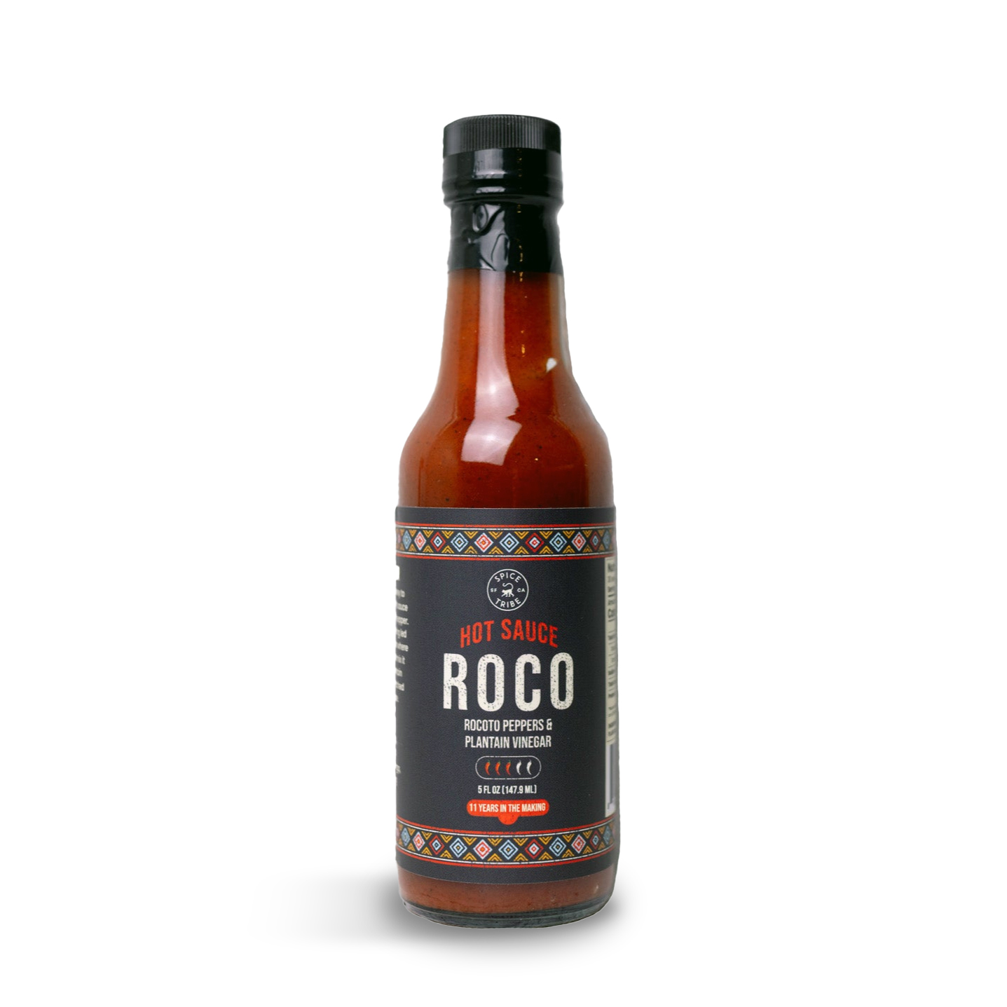 Bottle of Roco hot sauce with a black label and colorful border.
