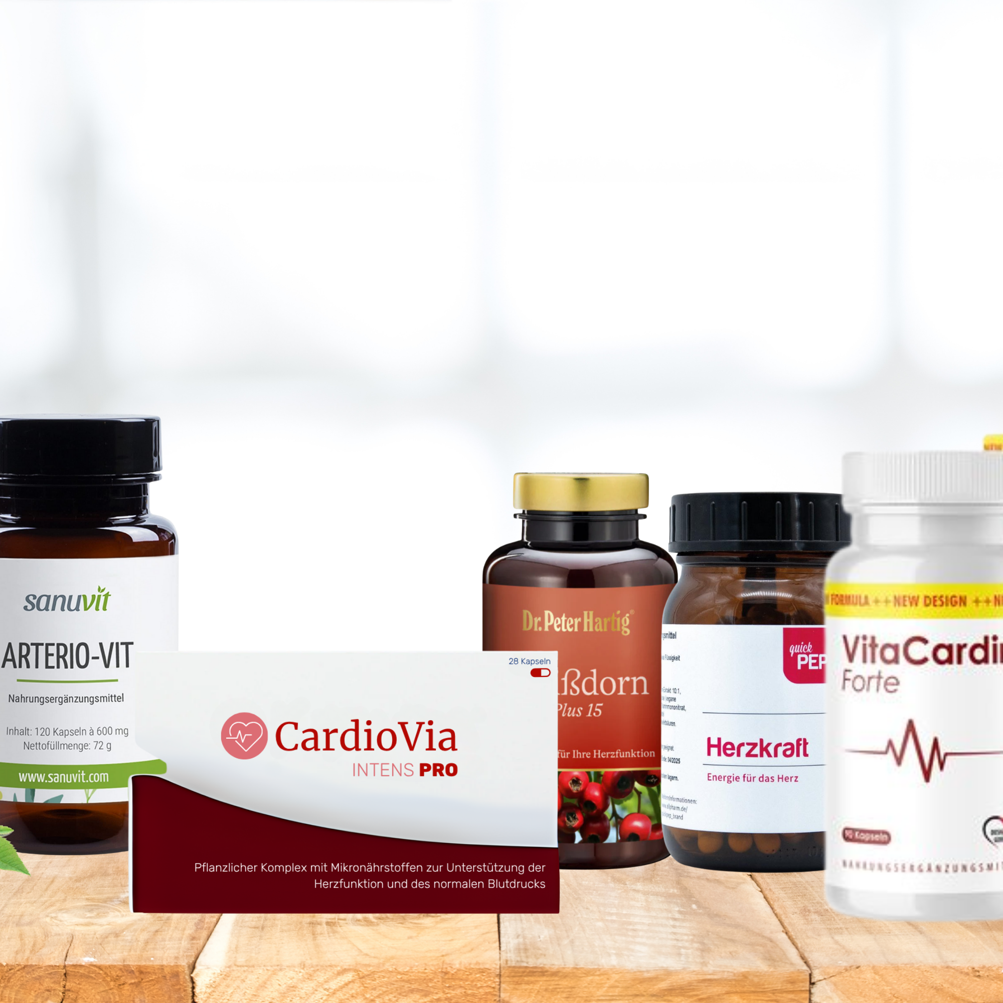 Various heart health supplement bottles and boxes on a wooden surface.