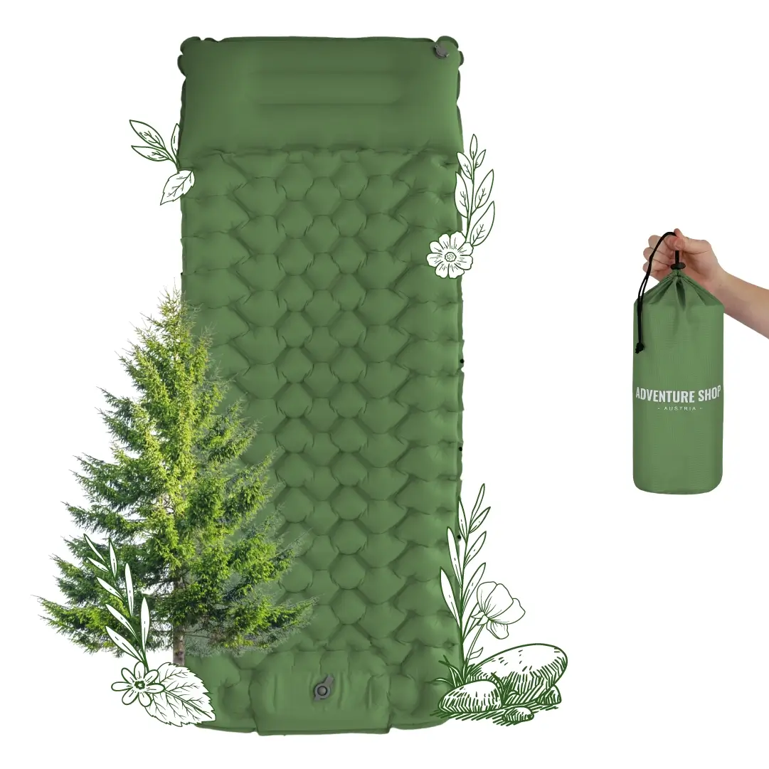 Green inflatable camping mat with nature illustrations and a hand holding a storage bag.