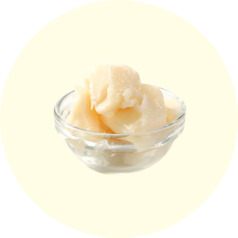 Small glass bowl with a white creamy substance inside.