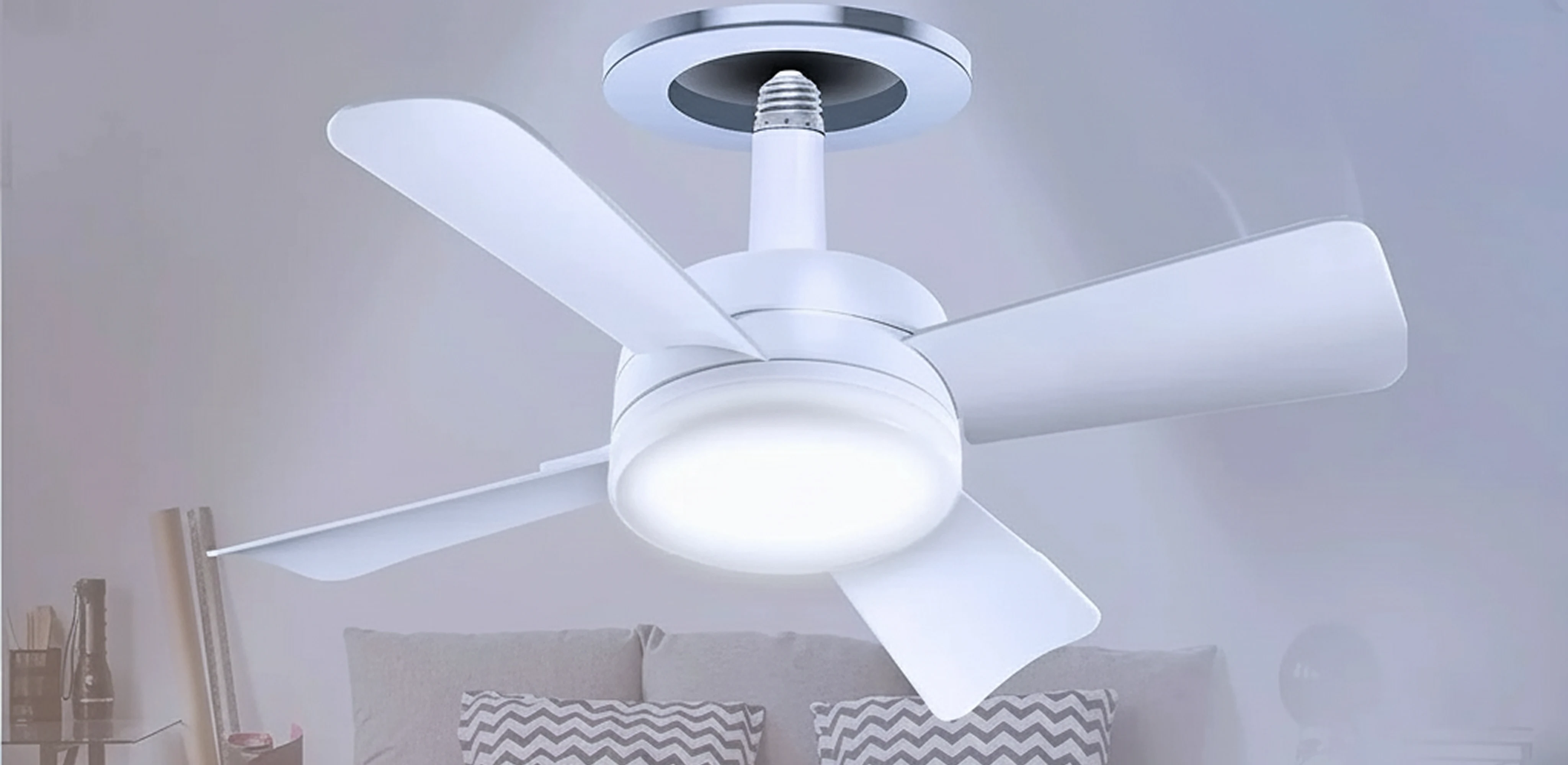White ceiling fan with light in a modern room setting.