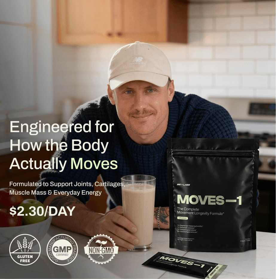 A man in a kitchen with a glass of a shake and a bag of MOVES-1 supplement.
