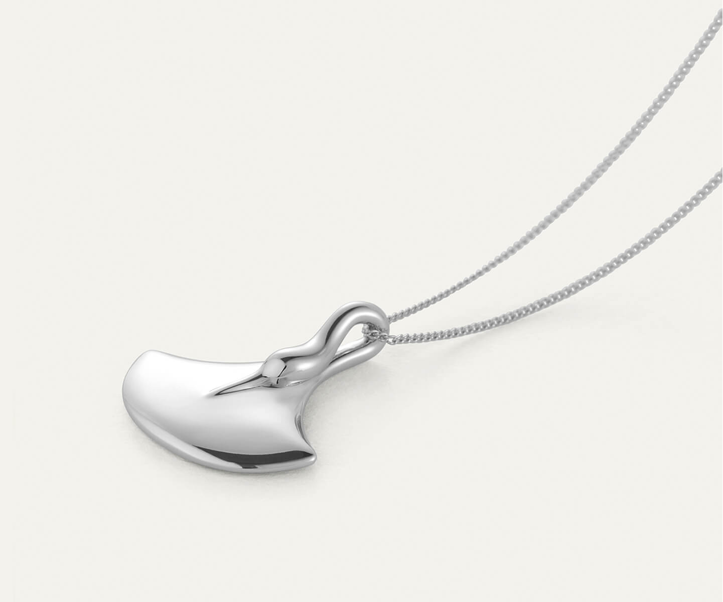 Silver axe-shaped pendant on a delicate chain.