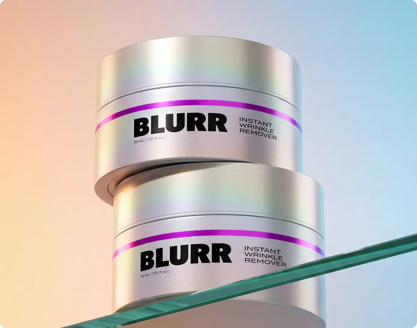 Two stacked silver jars of Blurr Instant Wrinkle Remover, with the bottom one resting on a glass shelf.