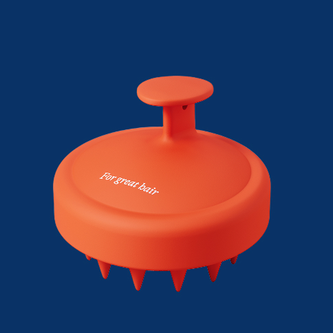 Orange scalp massager with text 'For great hair' on a blue background.
