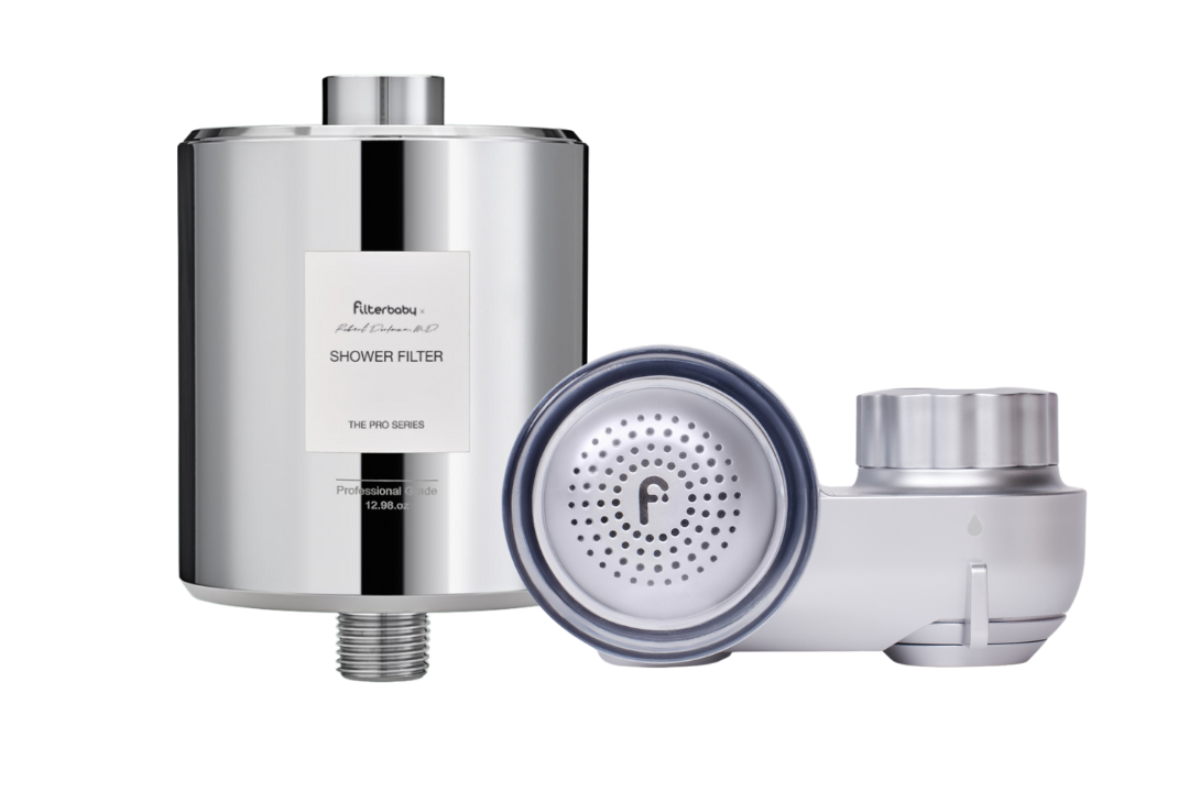 Silver shower filter and white showerhead with logo.