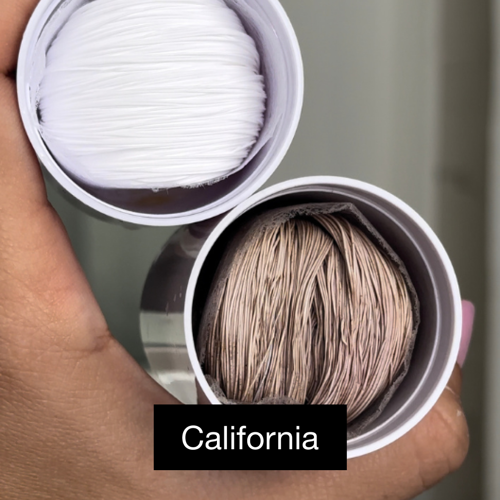 Two circular brushes with densely packed bristles, one white and one brown.