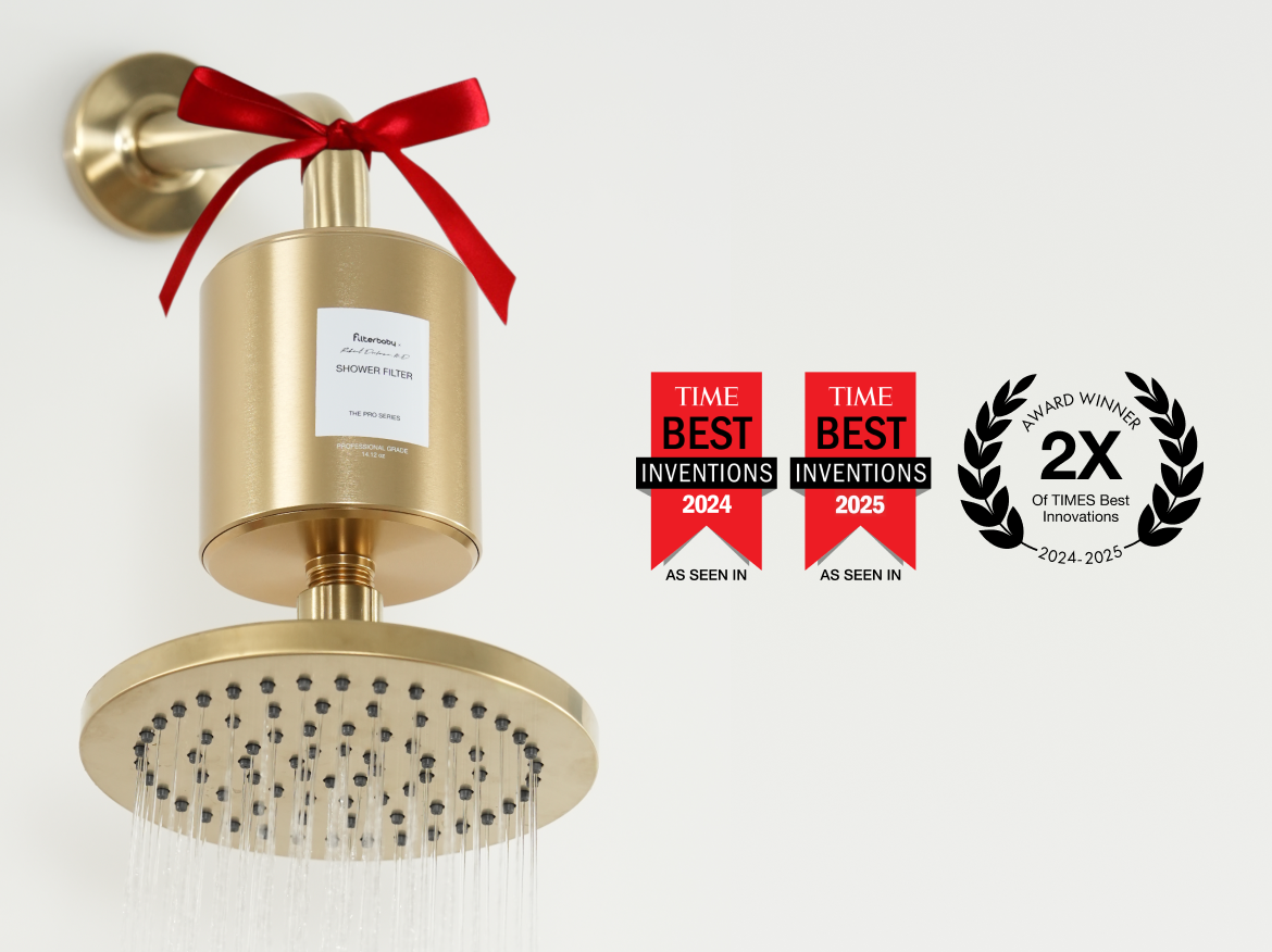 Gold shower filter with red bow, award logos displayed.