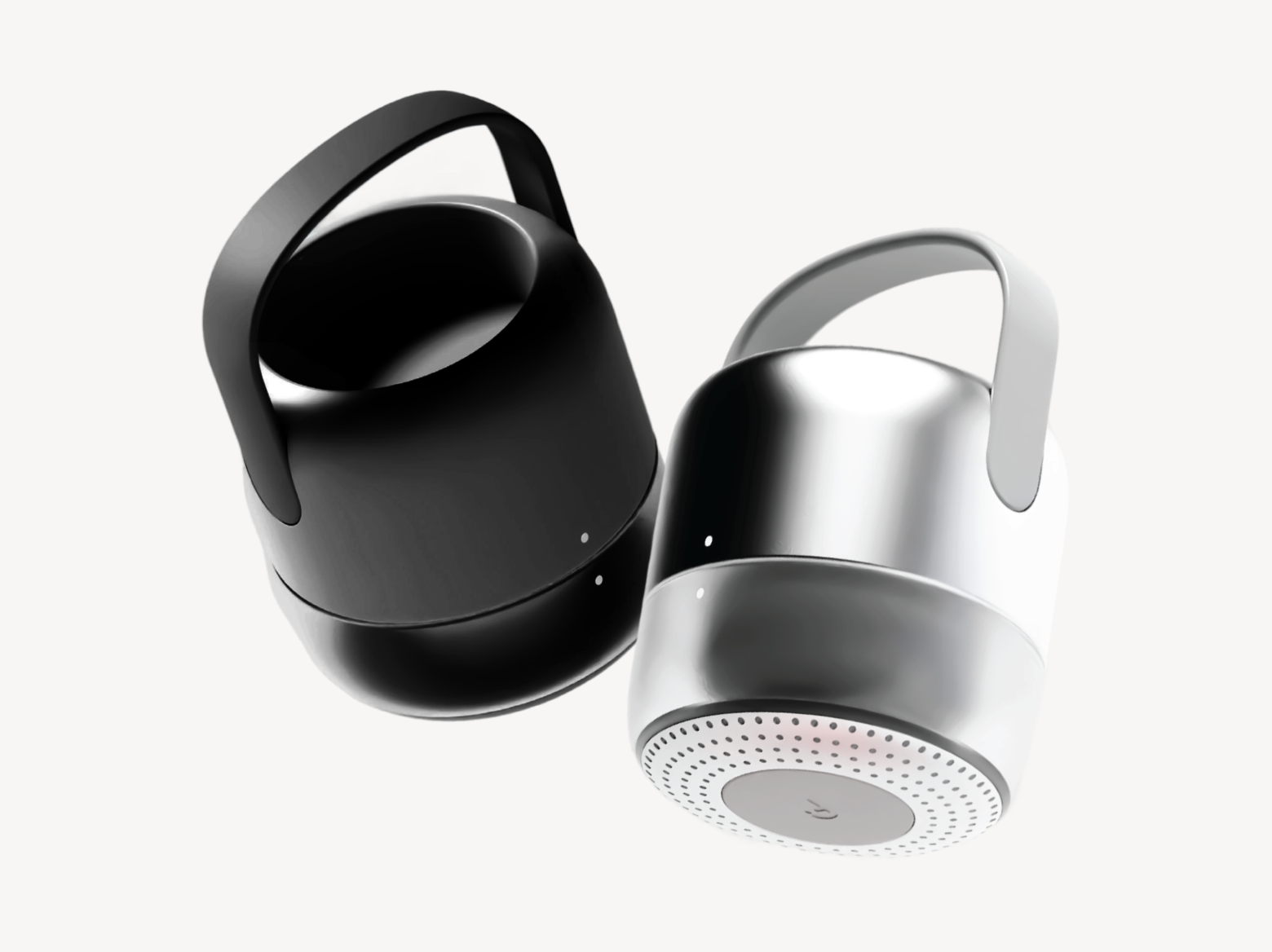 Two modern portable speakers with carrying handles, one black and one silver, against a white background.