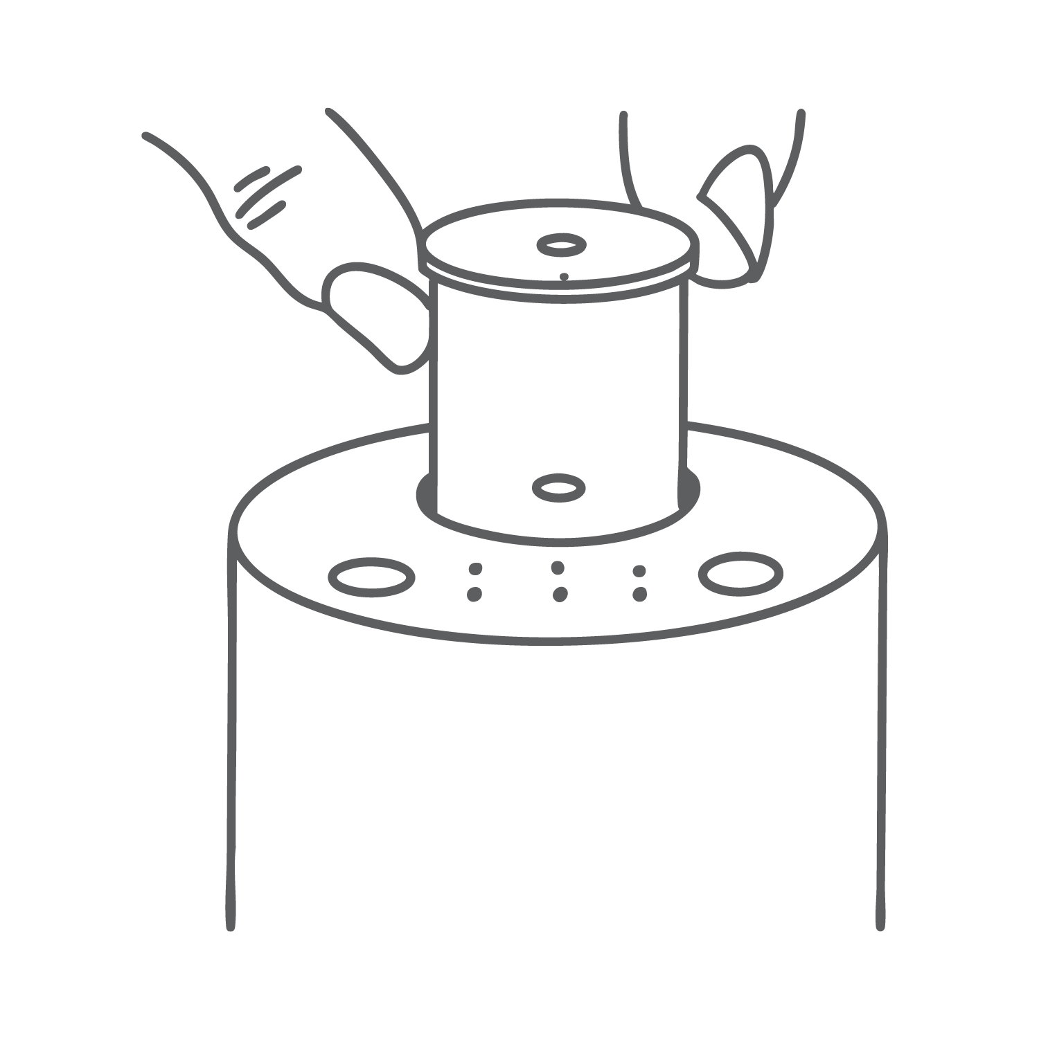 Illustration of hands placing a cylindrical object on a round base.