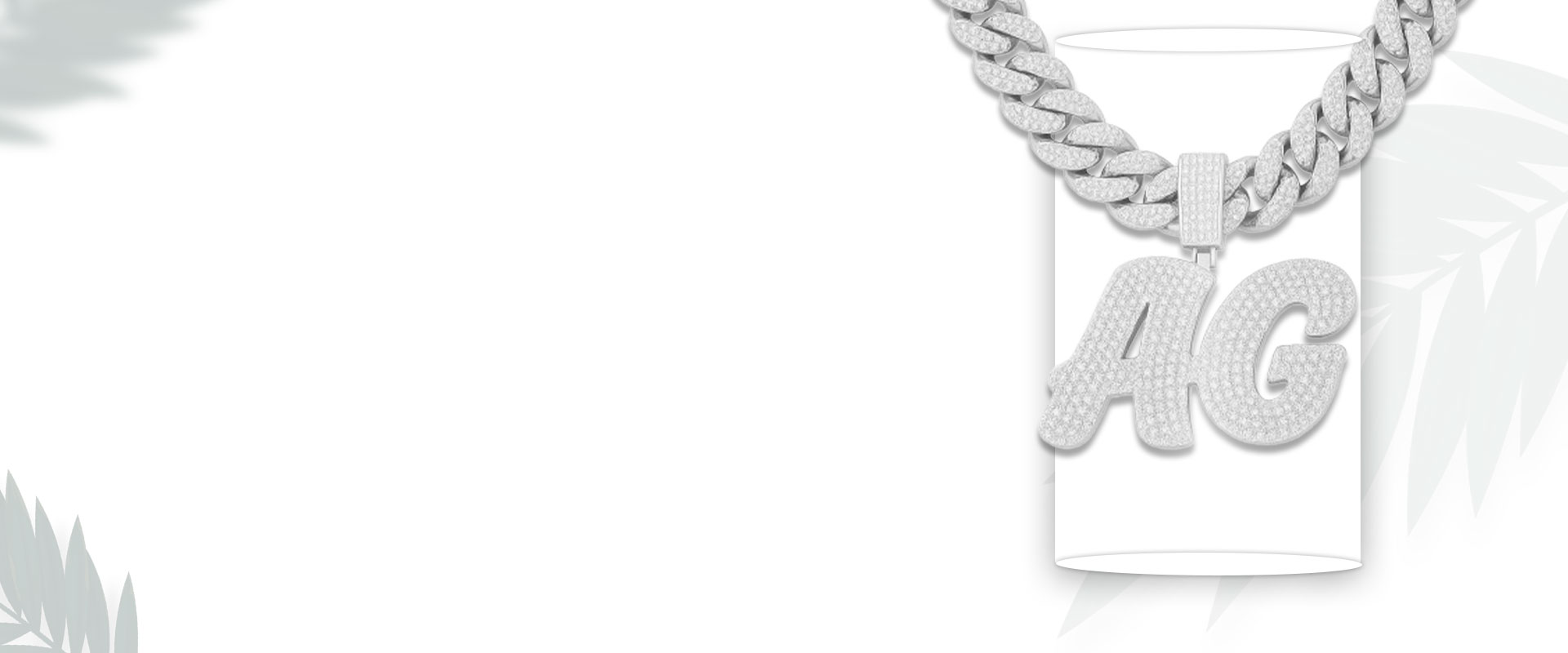 Silver chain necklace with 'AG' pendant on white background.