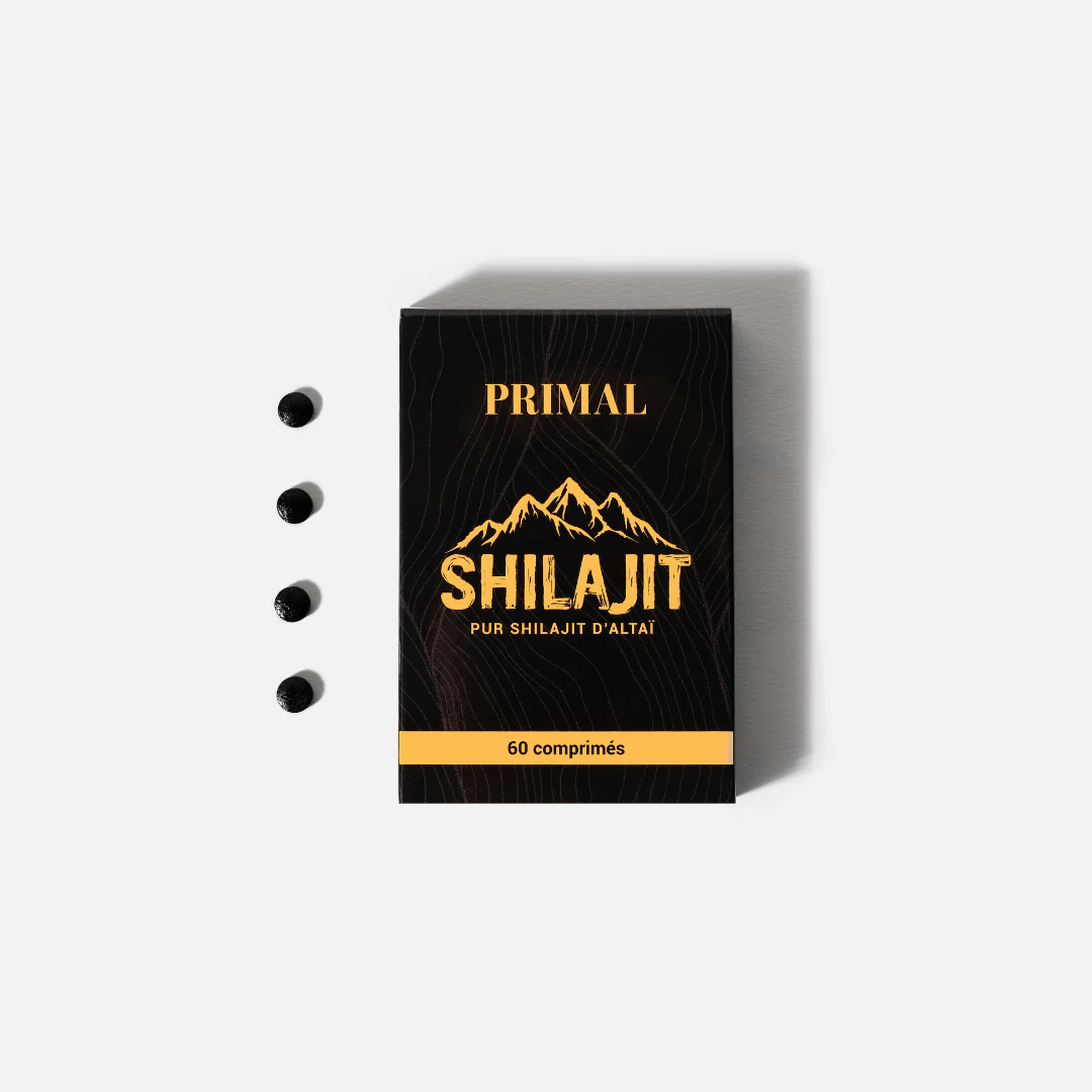 A black and gold box of Primal Shilajit with four black tablets lined up beside it.