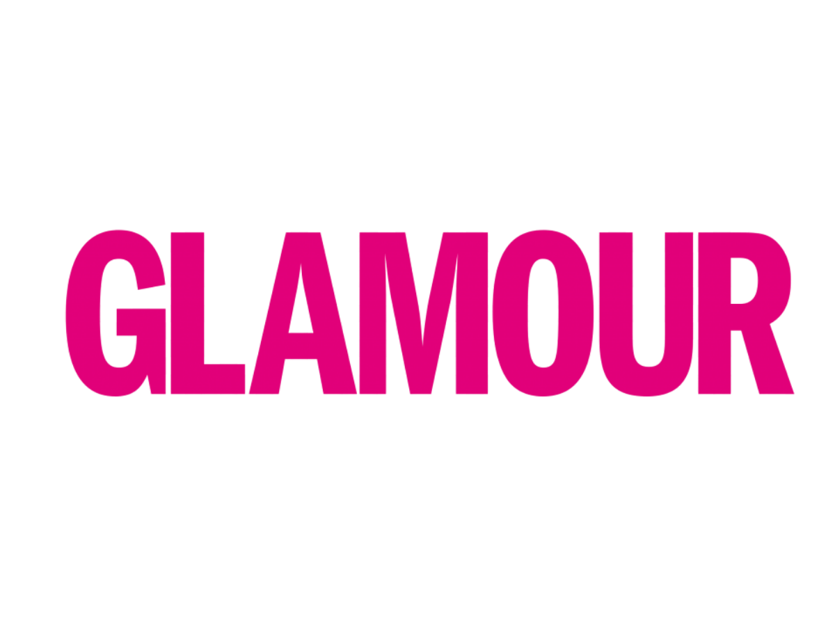 The word GLAMOUR in bold, pink, uppercase letters on a white background.
