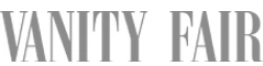 The logo for Vanity Fair magazine in a grey serif font on a white background.