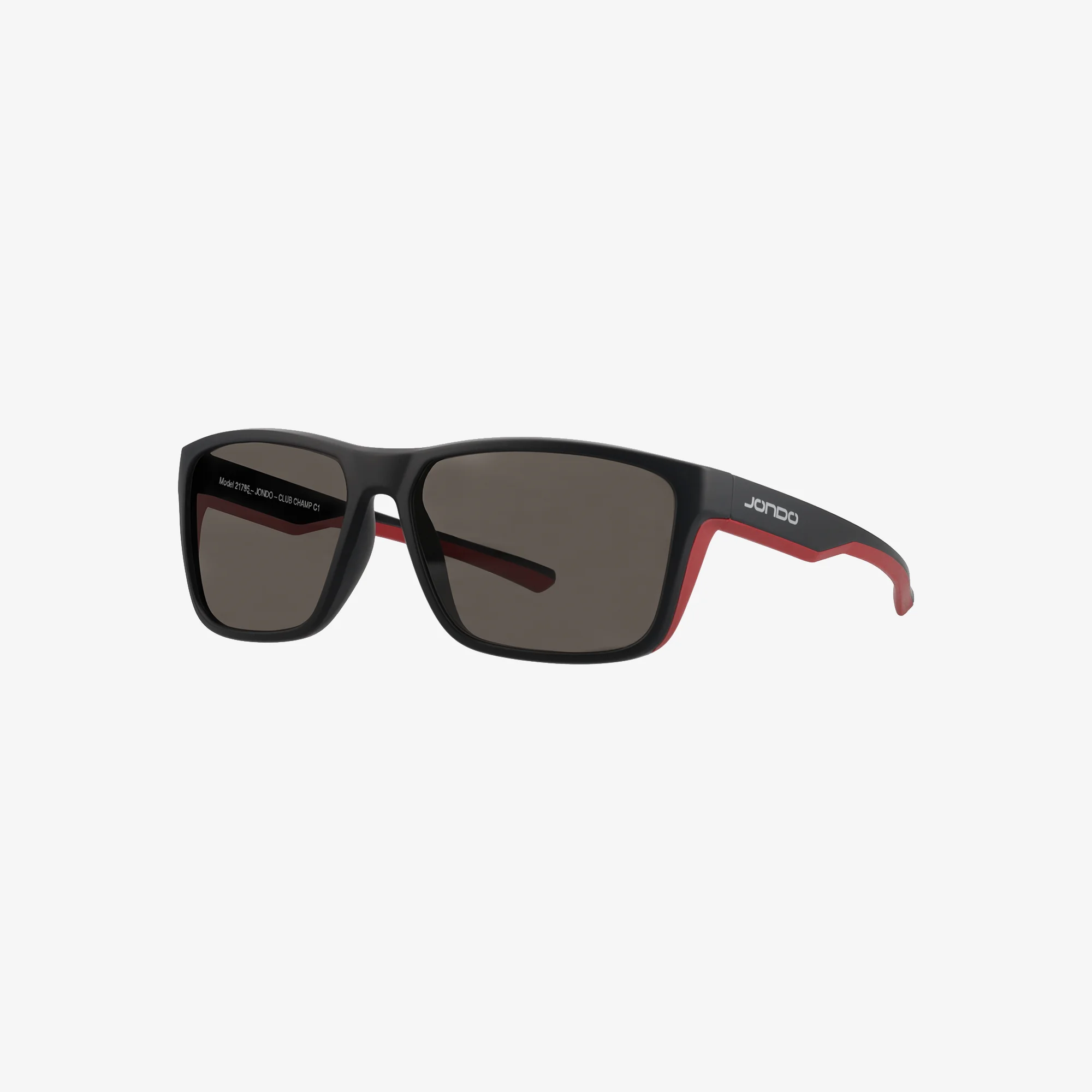 Black and red sunglasses with dark lenses on a white background.