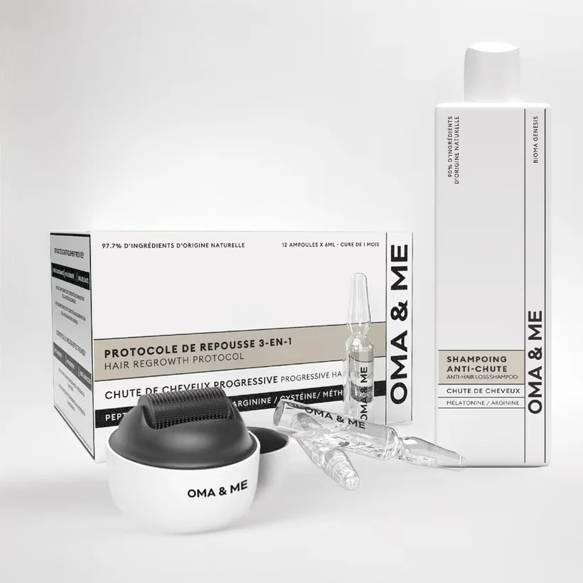 Hair regrowth products including shampoo, ampoules, and a roller labeled 'OMA & ME.'
