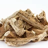 A small pile of dried, light-brown, woody-looking root pieces against a white background.