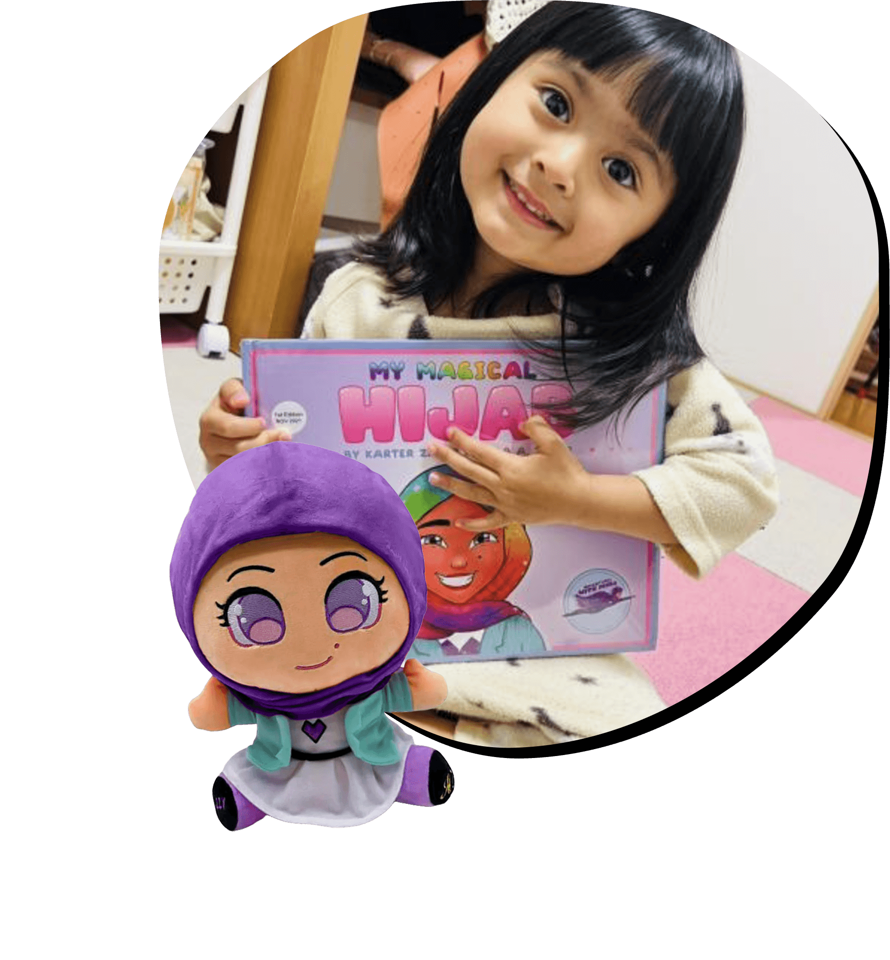 Child holding a book titled 'My Magical Hijab' with a matching plush toy.