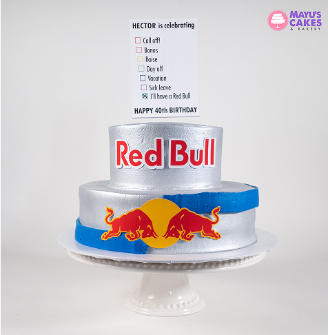 Two-tiered Red Bull-themed cake with a celebratory message on top.