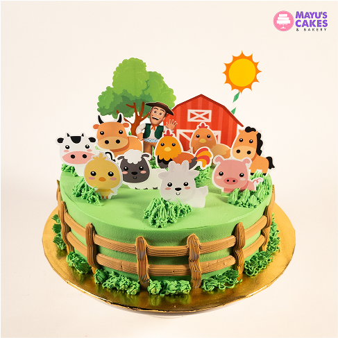 Farm-themed cake with animal and barn decorations.