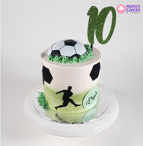 Soccer-themed cake with a ball topper and number ten decoration.