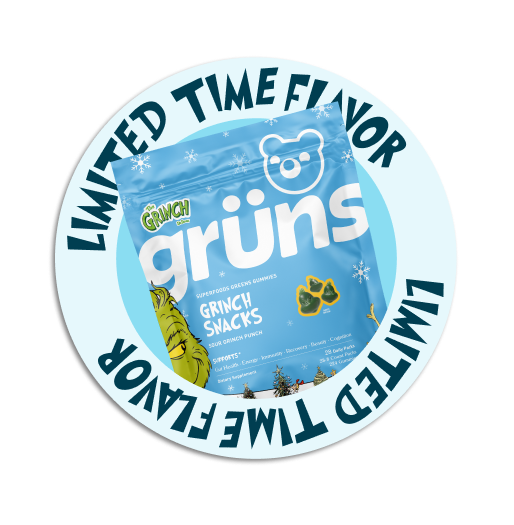 Blue packaging of Grinch-themed Grüns gummy snacks with limited-time flavor text.