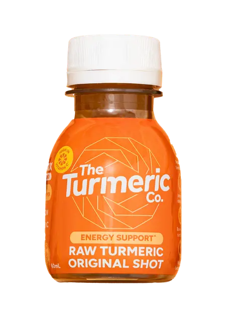 A small orange bottle of The Turmeric Co. Raw Turmeric Original Shot against a white background.