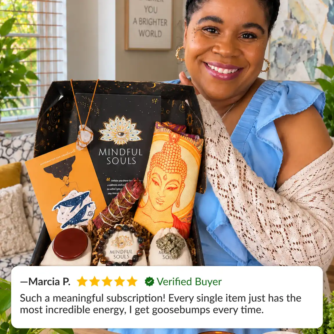 A smiling woman holds up an open Mindful Souls subscription box with a customer review below.
