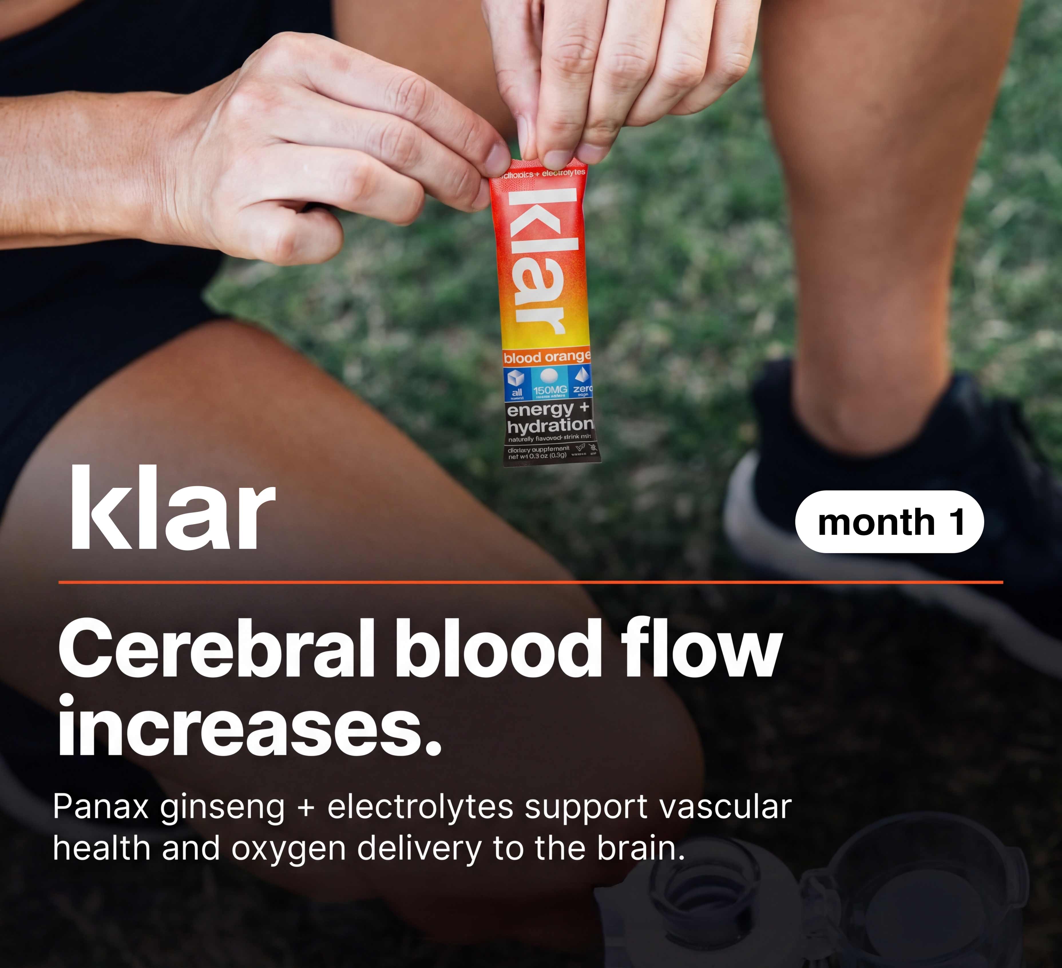 A person in athletic gear opens a red and orange packet of Klar energy and hydration supplement.