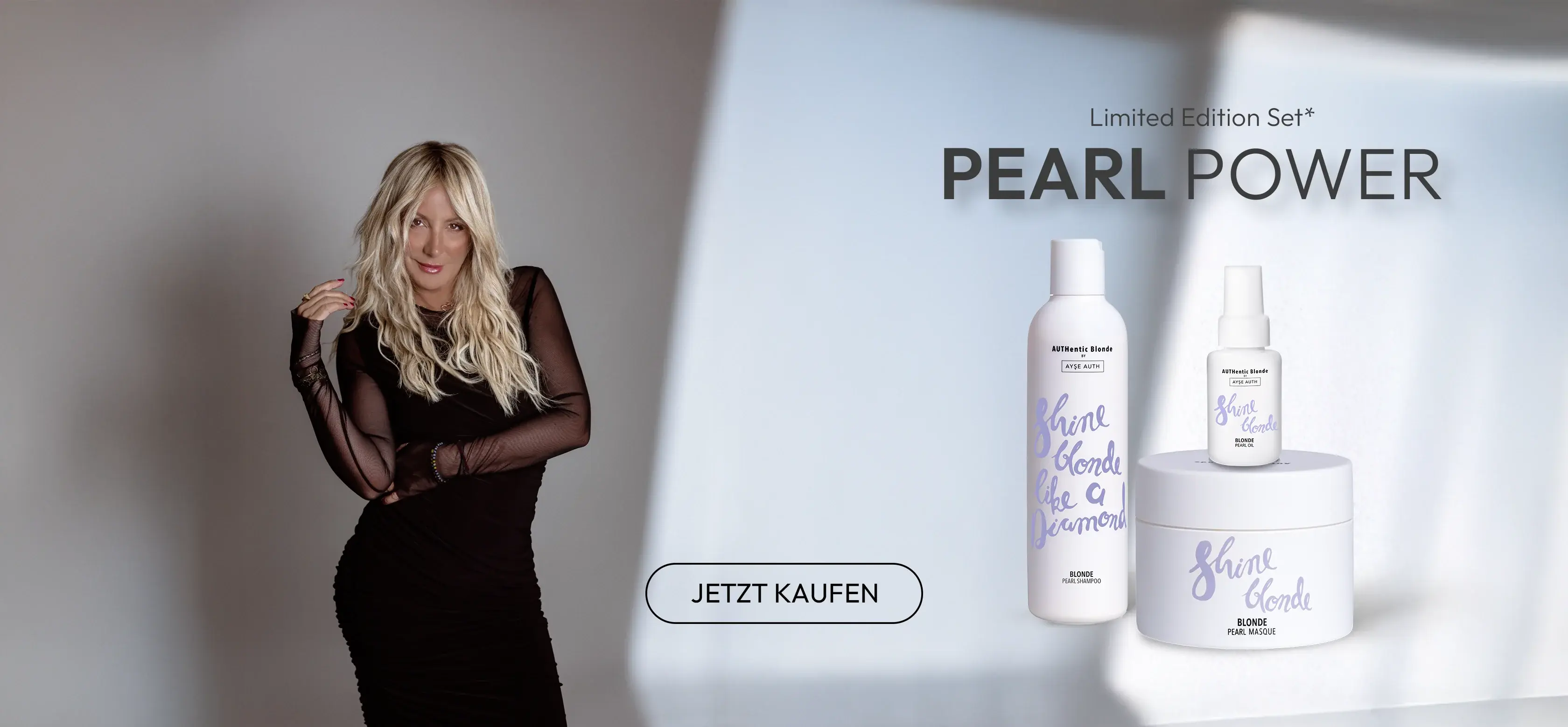 A promotional banner featuring a blonde woman and a set of 'Pearl Power' hair care products.