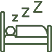 Simple icon of a person sleeping in bed with 'Z' symbols.