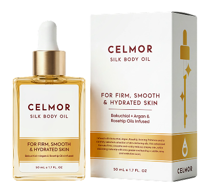 A bottle of Celmor Silk Body Oil with its dropper cap next to its white and gold box.