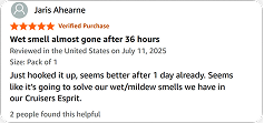 A screenshot of a five-star review from a verified purchase, titled 'Wet smell almost gone after 36 hours.'