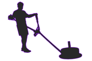 Silhouette of person operating a floor cleaning machine.