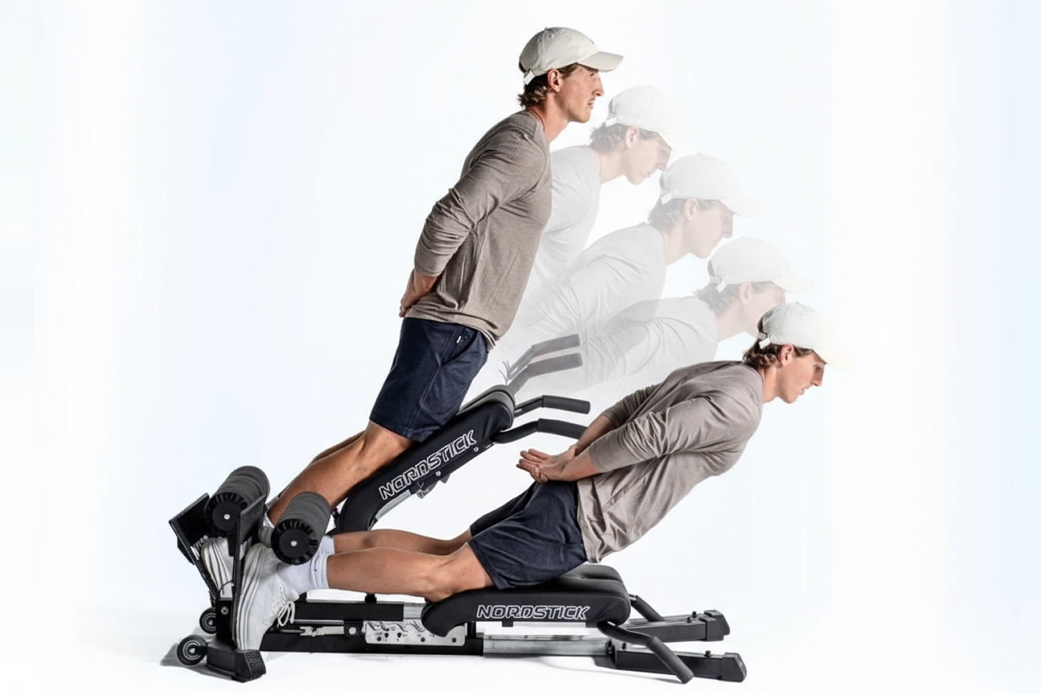 Man performing Nordic hamstring exercise on a specialized bench.