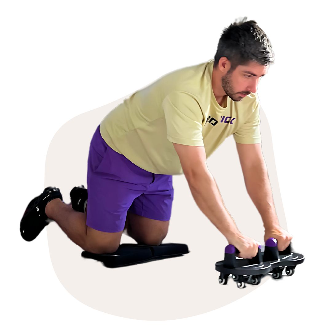 Man kneeling, using exercise equipment with wheels on a white background.