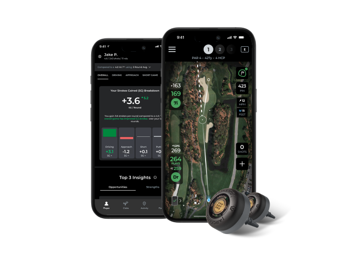 Two smartphones displaying a golf tracking app, with two small black sensors in front on a white background.