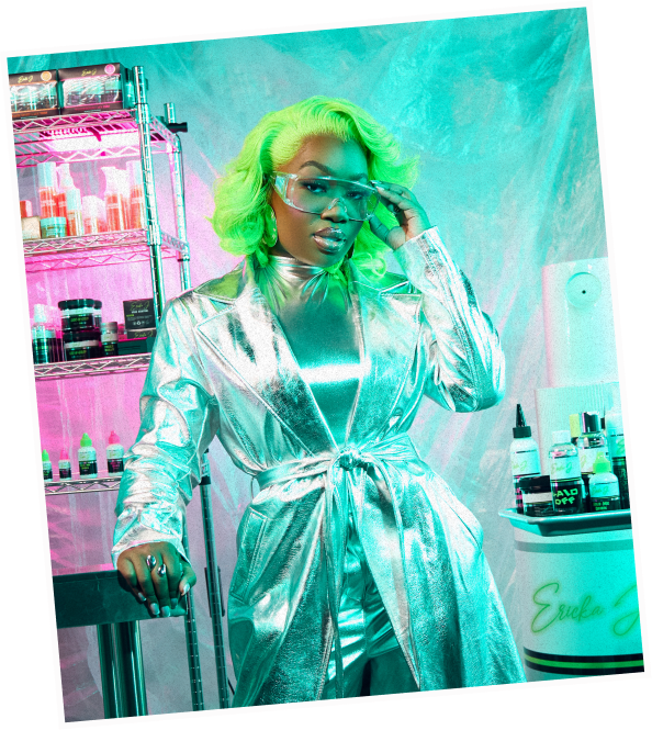 Ericka J founder posing with lace care products in studio