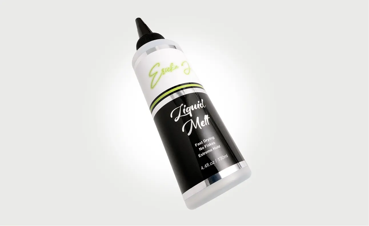A bottle of Ericka J Liquid Melt hair product floating against a plain light grey background.