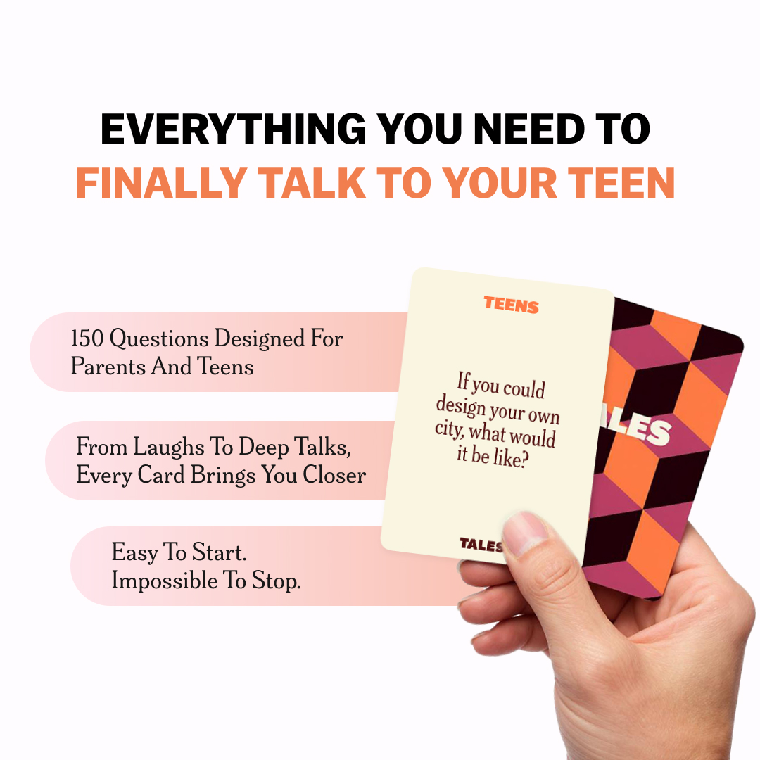 Hand holding conversation cards for parents and teens about designing a city.