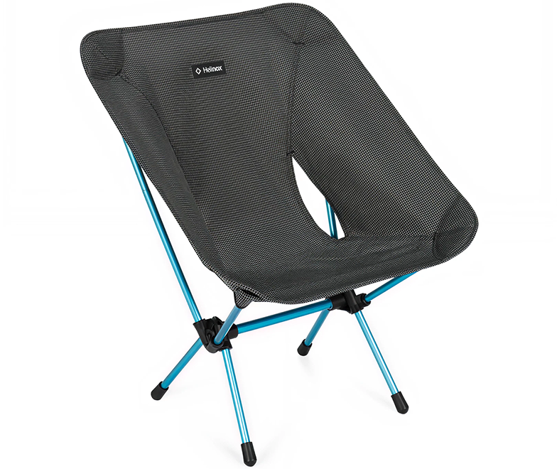 A lightweight Helinox camping chair with a gray patterned fabric seat and a blue frame on a white background.
