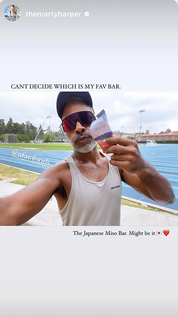 Man holding Afar savory protein bar