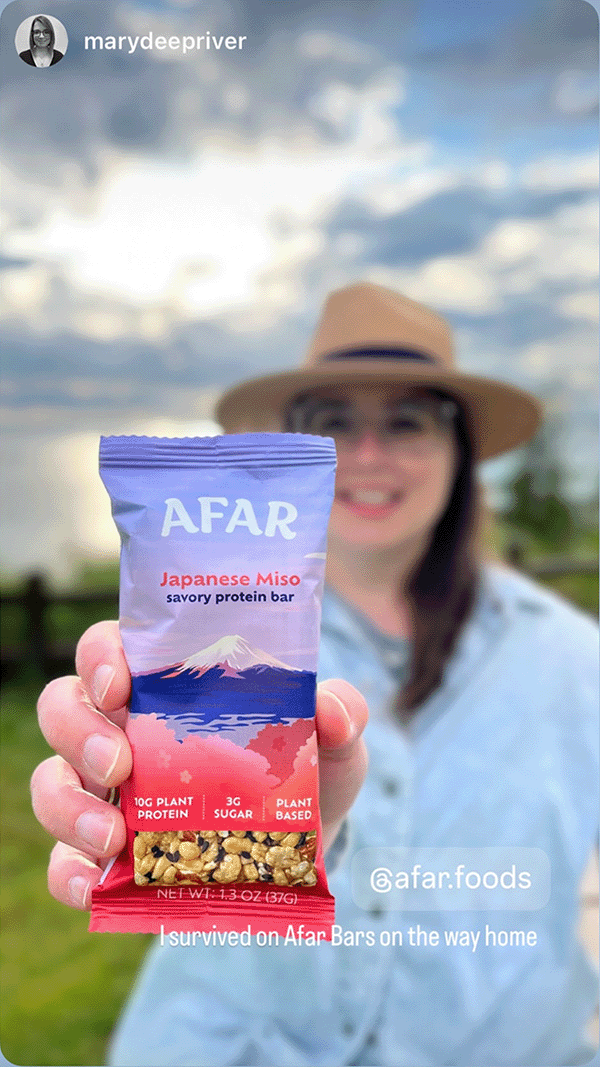 Woman holding Afar bar